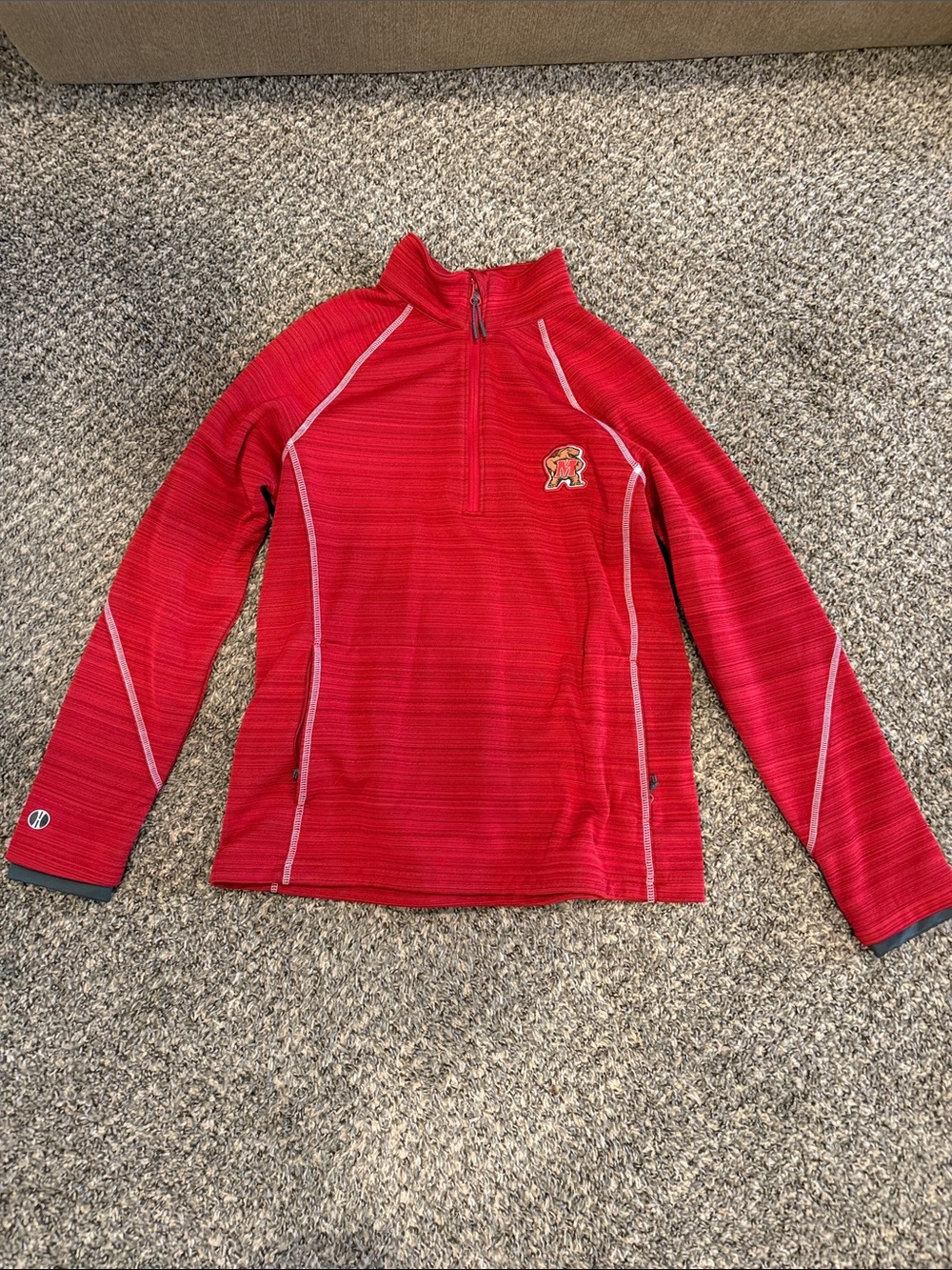 Woman’s University of Maryland Holloway Red Quarter-Zip Performance Pullover